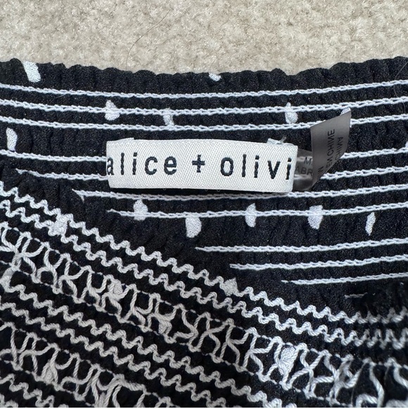 EUC Alice + Olivia Women's Black Polka Dot Mini Skirt Size M - Picture 6 of 6